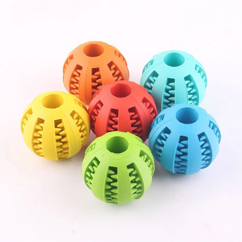 pet leaking ball toys dogs playing with natural rubber leaking device grappling.